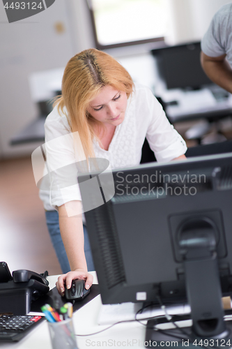 Image of designers in office at the wooden furniture manufacture