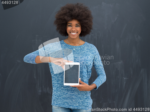 Image of Happy African American Woman Using Digital Tablet