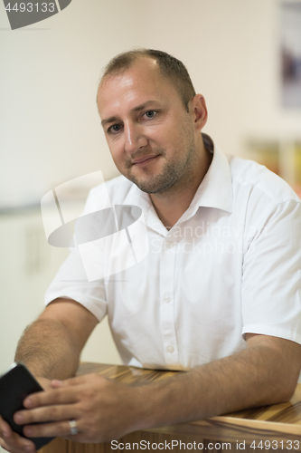 Image of designer in his furniture manufacturing workshop