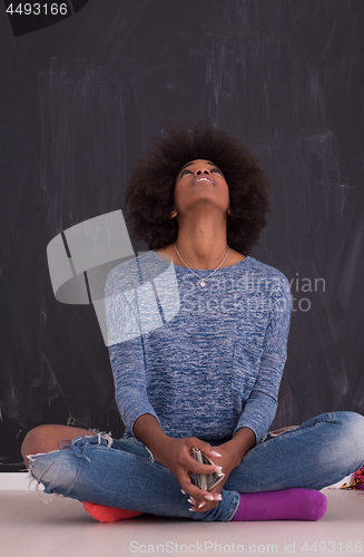 Image of African American woman isolated on a gray background