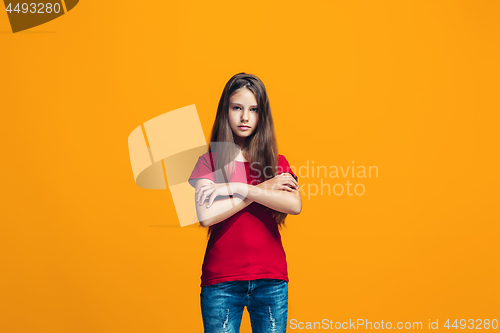 Image of Young serious thoughtful teen girl. Doubt concept.