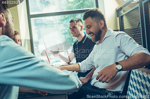 Image of Team job while relaxing in pub.