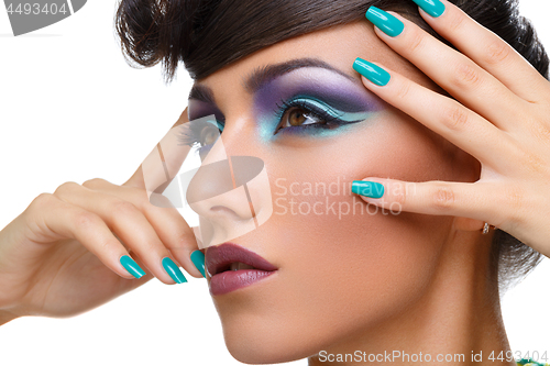 Image of Beautiful girl with bright vivid purple make-up 