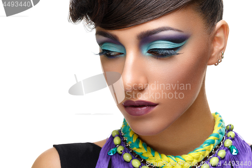 Image of Beautiful girl with bright vivid purple make-up 