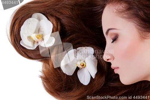 Image of Beautiful girl with long red hair