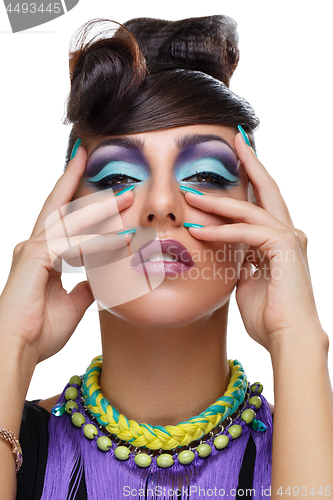 Image of Beautiful girl with bright vivid purple make-up 