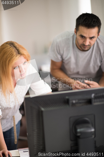 Image of designers in office at the wooden furniture manufacture