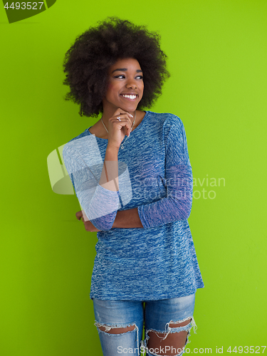 Image of black woman isolated on a Green background