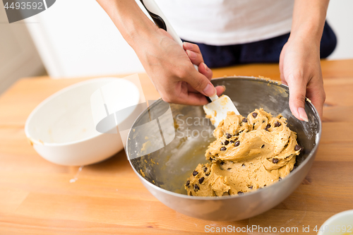 Image of Stirring the paste in bowl