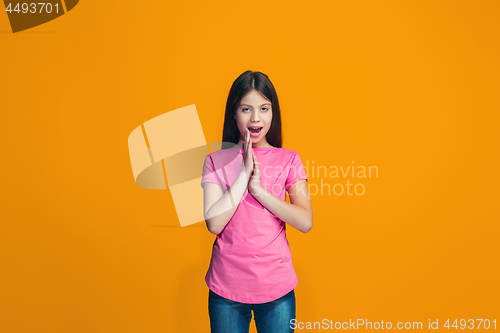 Image of Isolated on pink young casual teen girl shouting at studio