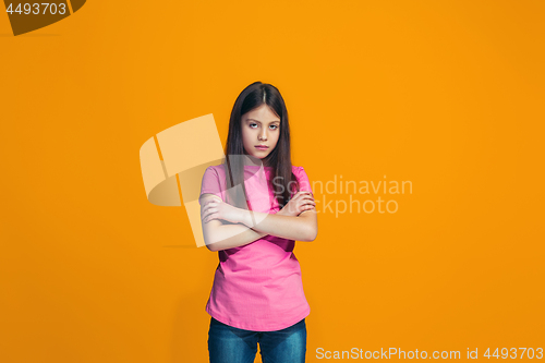 Image of Young serious thoughtful teen girl. Doubt concept.