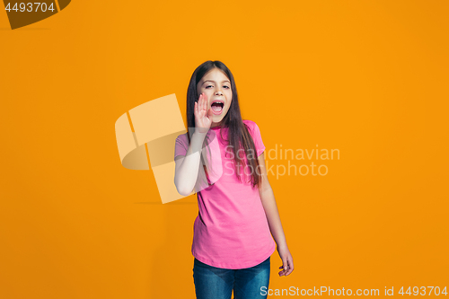 Image of Isolated on pink young casual teen girl shouting at studio