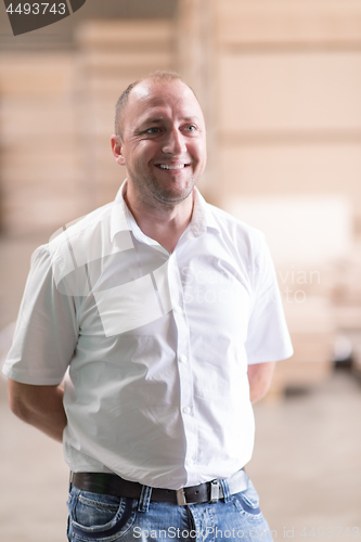 Image of designer in his furniture manufacturing workshop