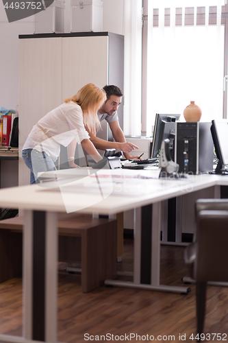 Image of designers in office at the wooden furniture manufacture