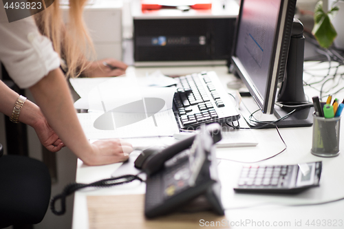 Image of designers in office at the wooden furniture manufacture