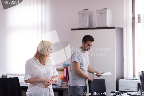 Image of designers in office at the wooden furniture manufacture