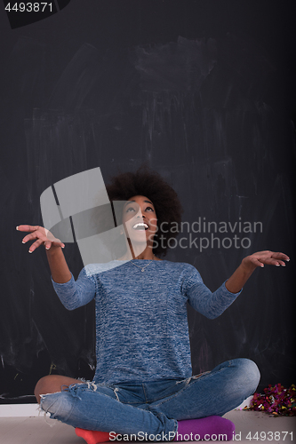 Image of African American woman isolated on a gray background