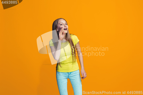 Image of Isolated on pink young casual teen girl shouting at studio