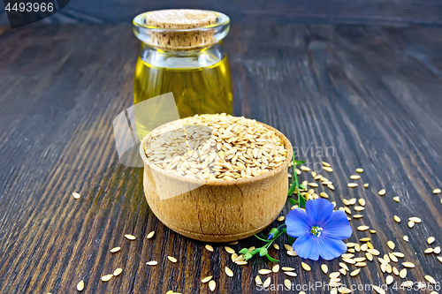 Image of Flaxen white seed in bowl with oil on board