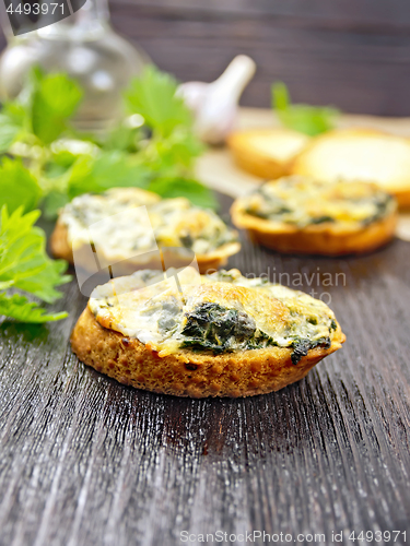 Image of Sandwich of nettle on dark board