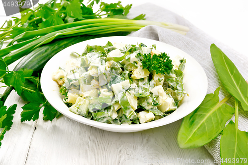 Image of Salad with potatoes and sorrel on light board
