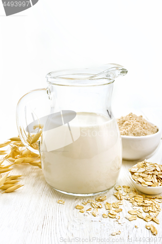 Image of Milk oatmeal in jug on light board