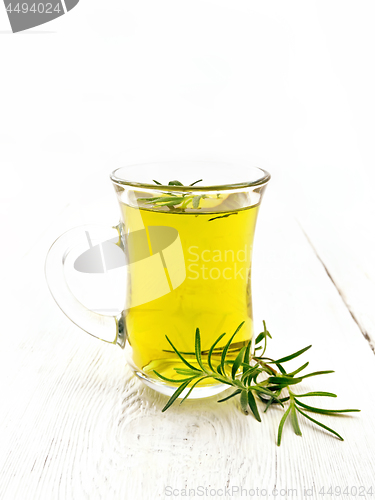 Image of Tea of rosemary in mug on board