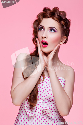 Image of Beautiful girl in dress with braided hair