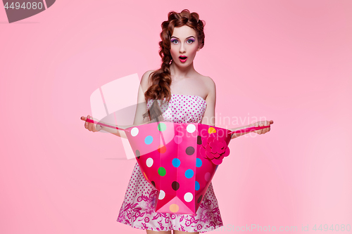 Image of Beautiful girl with shopping bag