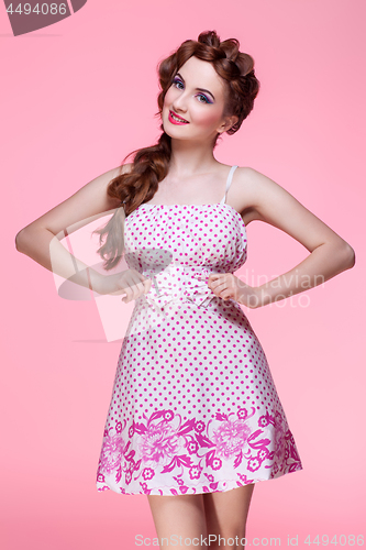 Image of Beautiful girl in dress with braided hair