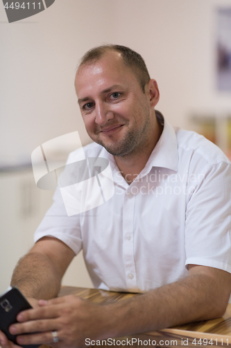 Image of designer in his furniture manufacturing workshop