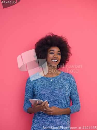 Image of black Woman Using Digital Tablet