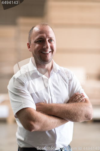 Image of designer in his furniture manufacturing workshop