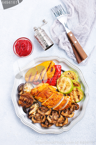 Image of chicken barbecue and grilled vegetables