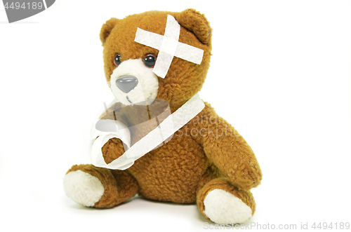 Image of Injured teddy bear with bandages