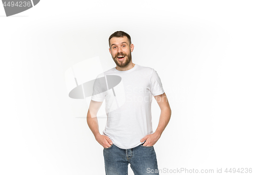 Image of Closeup of young man\'s body in empty white t-shirt isolated on white background. Mock up for disign concept