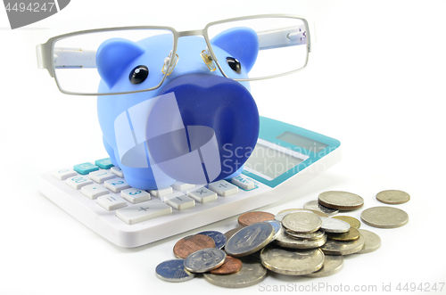 Image of Blue piggybank with coins