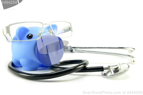 Image of Stethoscope and piggy bank