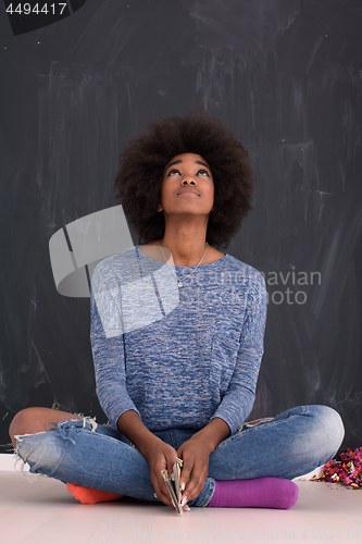 Image of African American woman isolated on a gray background