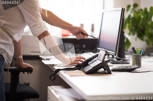 Image of designers in office at the wooden furniture manufacture