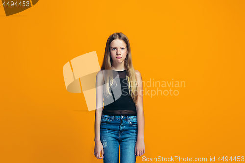 Image of Young serious thoughtful teen girl. Doubt concept.