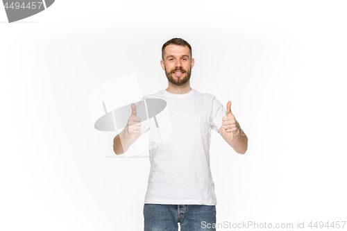 Image of Closeup of young man\'s body in empty white t-shirt isolated on white background. Mock up for disign concept