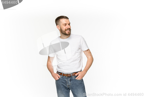 Image of Closeup of young man\'s body in empty white t-shirt isolated on white background. Mock up for disign concept