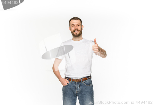 Image of Closeup of young man\'s body in empty white t-shirt isolated on white background. Mock up for disign concept