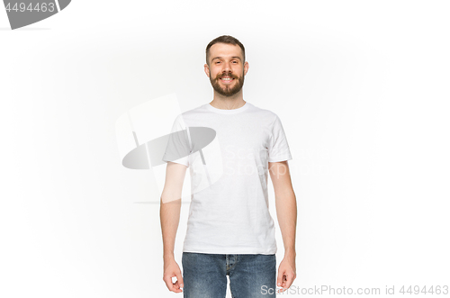 Image of Closeup of young man\'s body in empty white t-shirt isolated on white background. Mock up for disign concept