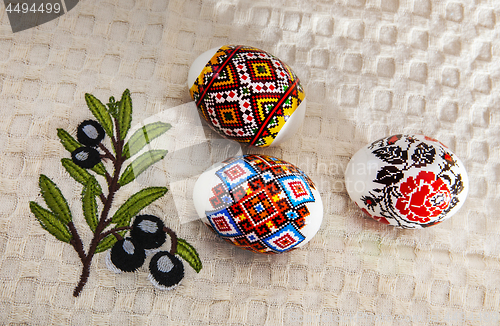 Image of Colorful Easter Eggs on White Towel