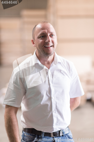 Image of designer in his furniture manufacturing workshop