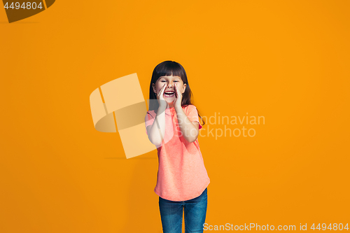 Image of Isolated on pink young casual teen girl shouting at studio