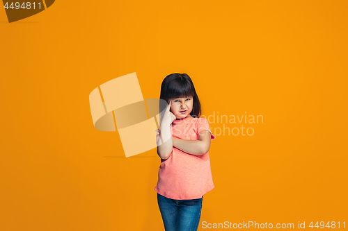 Image of Young serious thoughtful teen girl. Doubt concept.