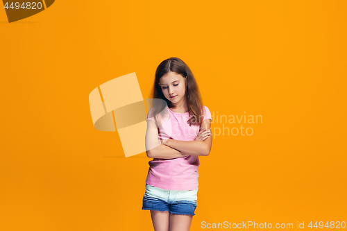 Image of Young serious thoughtful teen girl. Doubt concept.